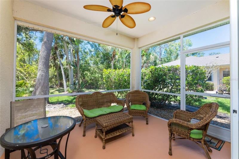 Covered lanai space with ceiling fan
