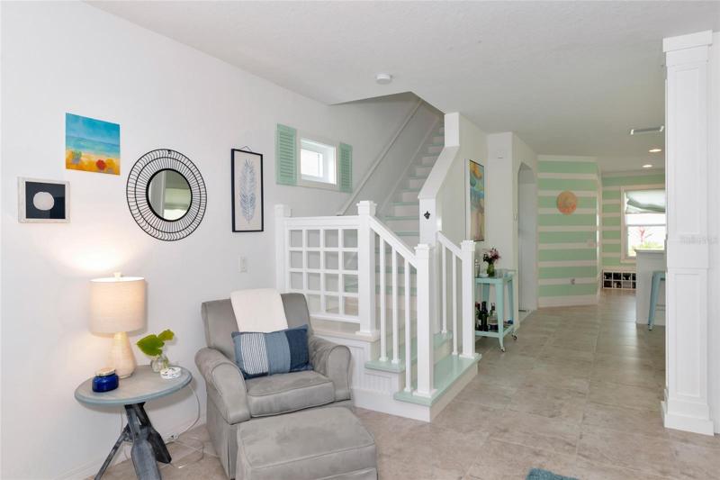 Colorful painted staircase and feature wall in Kitchen