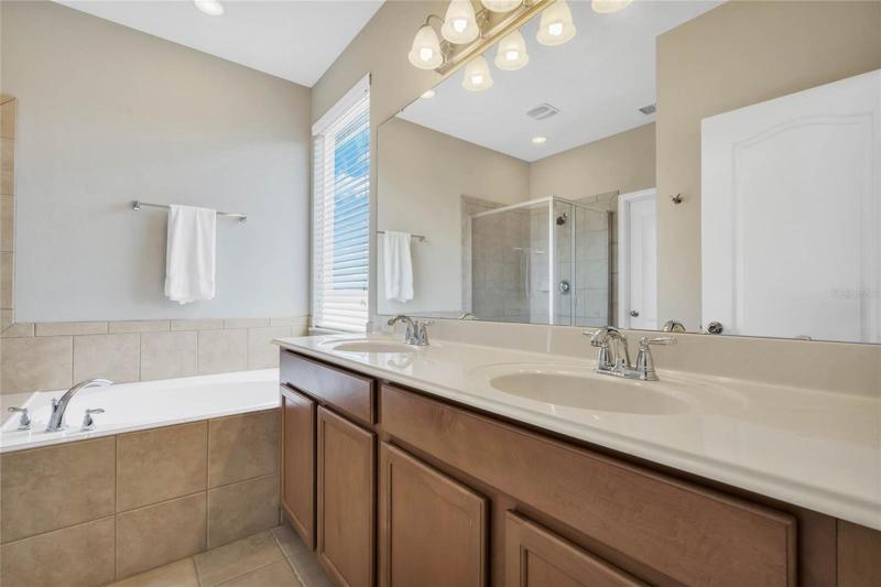 Master bath with garden tub and separate shower.