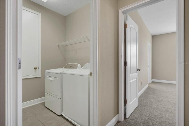 Laundroom room conveniently located upstairs.