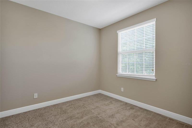 Bedroom three is also light and bright.