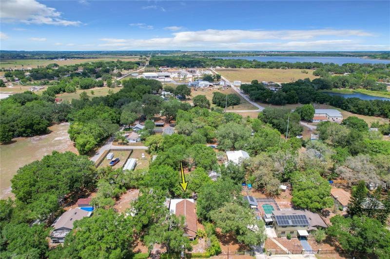 Located on 3 lots that total almost 1/2 acre, the backyard offers a garden-like setting with plenty of landscaping to provide privacy