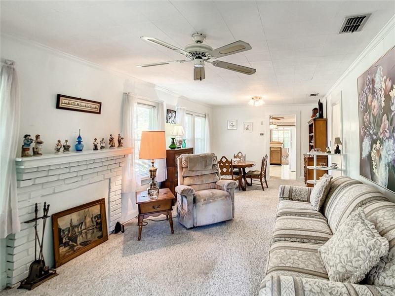 Walking from the front of the home you will move to the living room, dining room and then the kitchen.