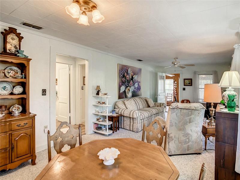 Looking from the dining room to the living room.  The doors on the left side of the picture open to the guest bath and the guest bedroom.