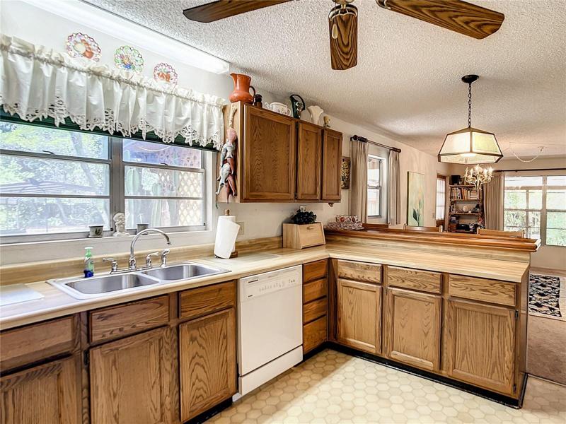 The kitchen is the center of the home with a large breakfast bar.