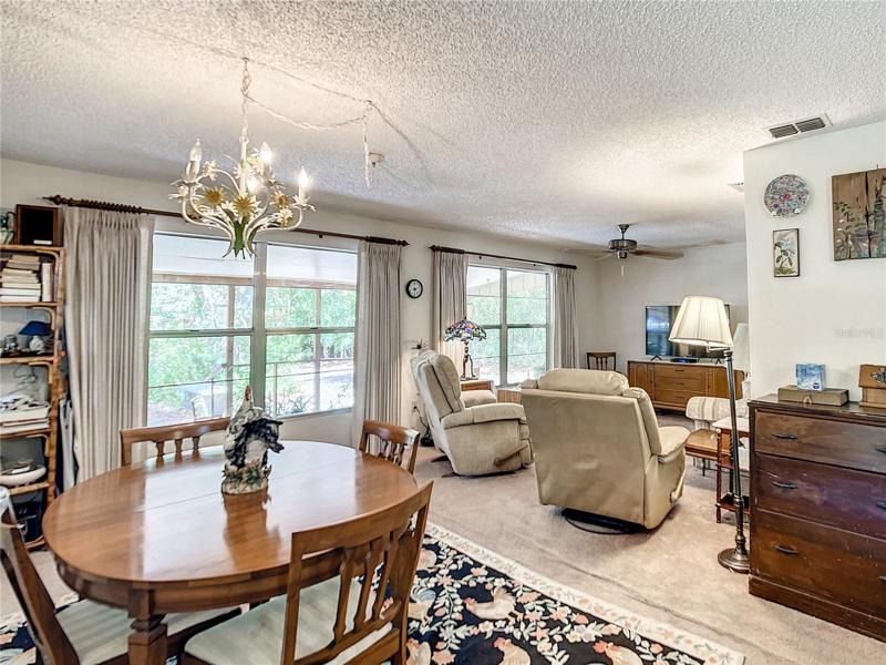 2nd dining room/family room with back yard view is on the opposite end of the kitchen