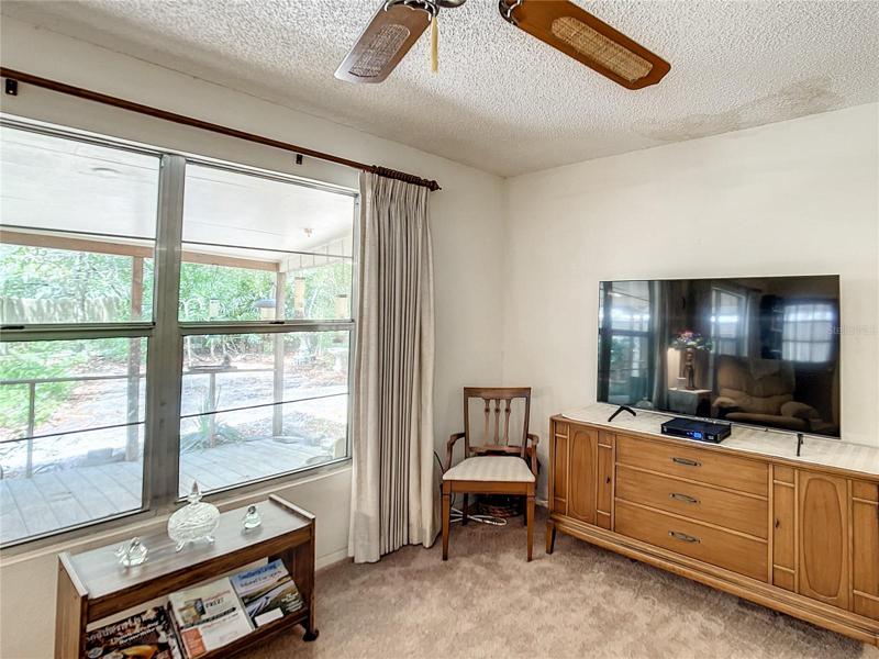 Family room offers a great view of the private back yard.