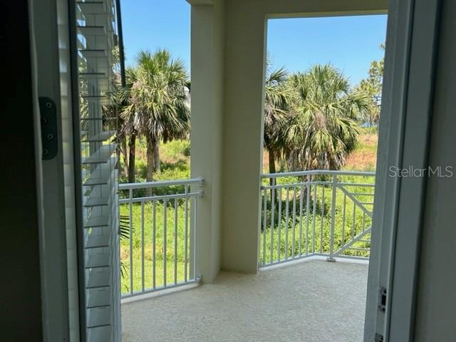 Door In Living Room Leading To Porch