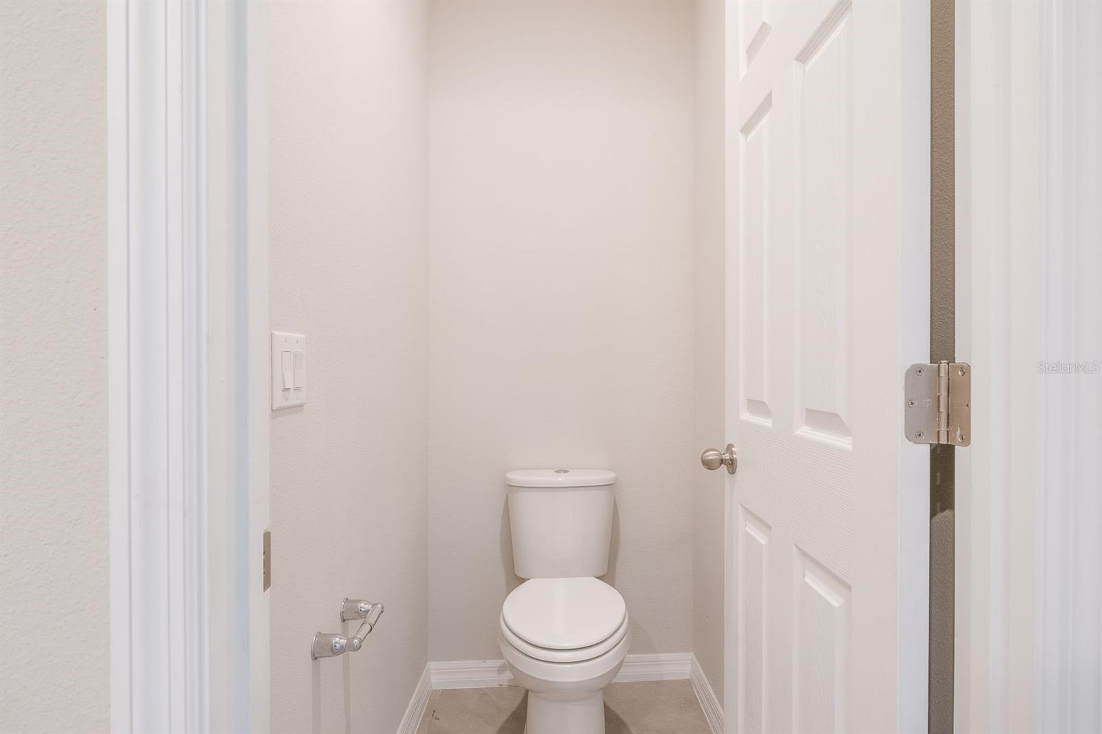 Primary private toilet room with door