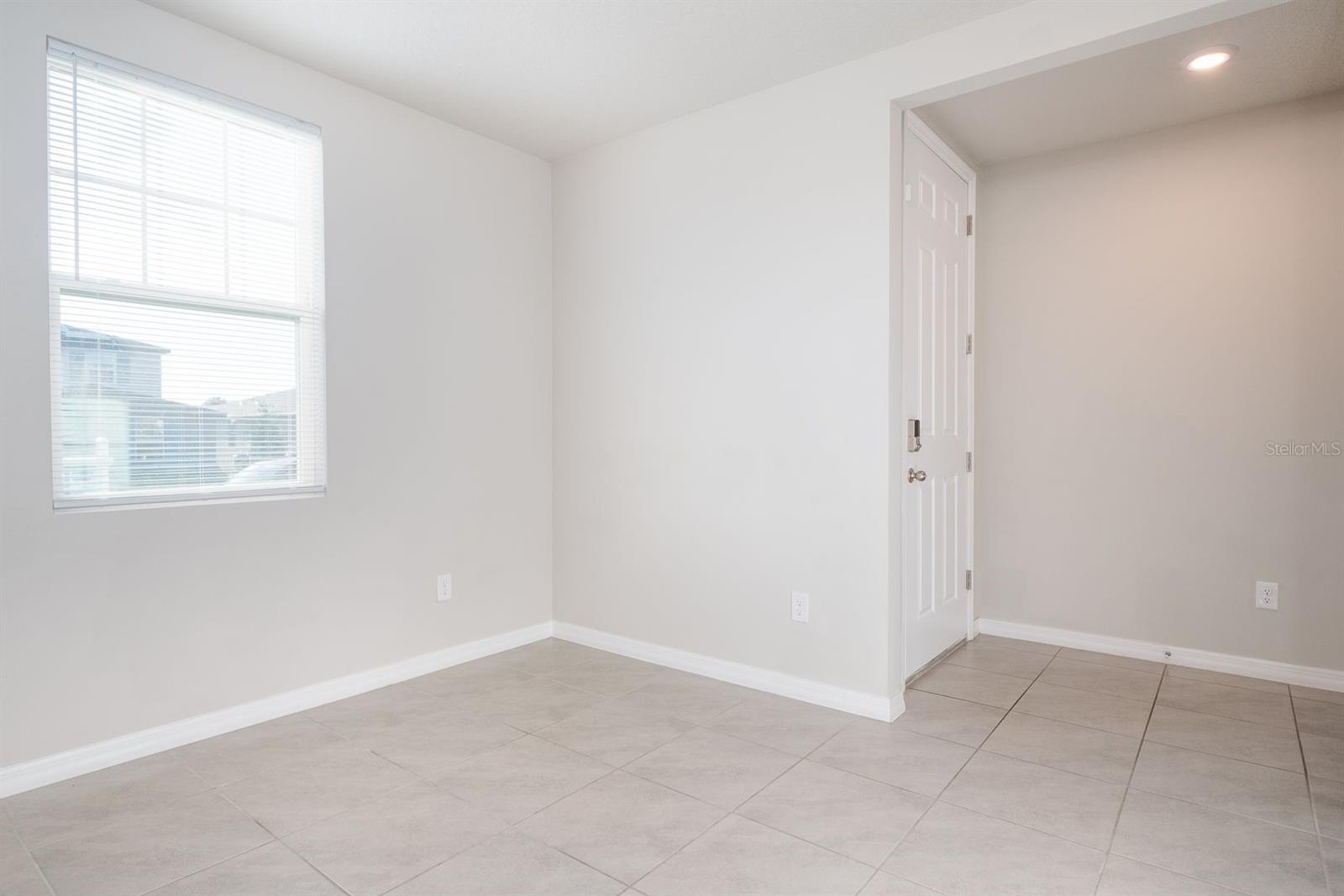 Flex room view 2 looking outward towards foyer and front door.\" title=