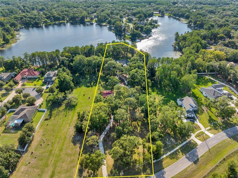 158 (MOL) feet of lakefront on Half Moon Lake on 3 acres (MOL).
