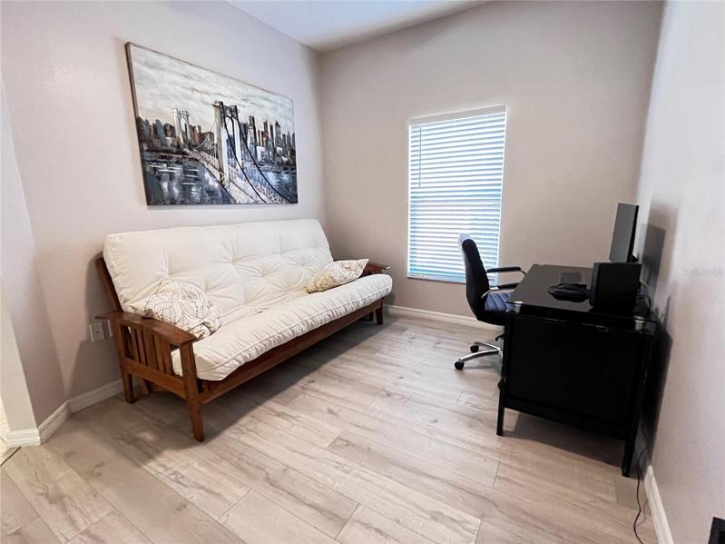 Den w/ Vinyl Plank Flooring