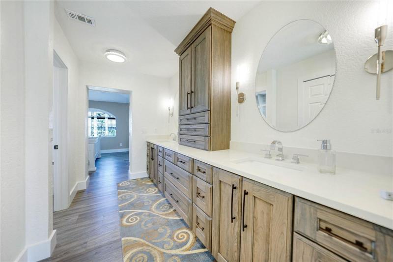 master bathroom vanity looking towards the master bedroom, closet and bathroom is on the left side