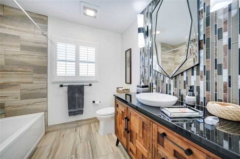 custom designed guest bathroom is absolutely beautiful and will be perfect for your overnight guests