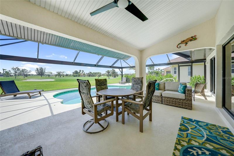 multiple areas available to entertain in covered and uncovered areas.  Notice the wide open views from the clearview screen...no bars to inhibit the view!