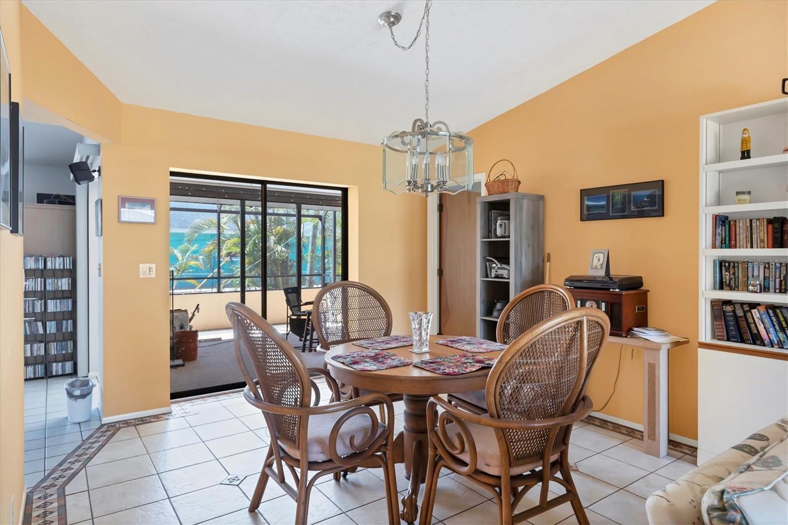 Dining Room.  Sliders stack on the outside opening up the living area.