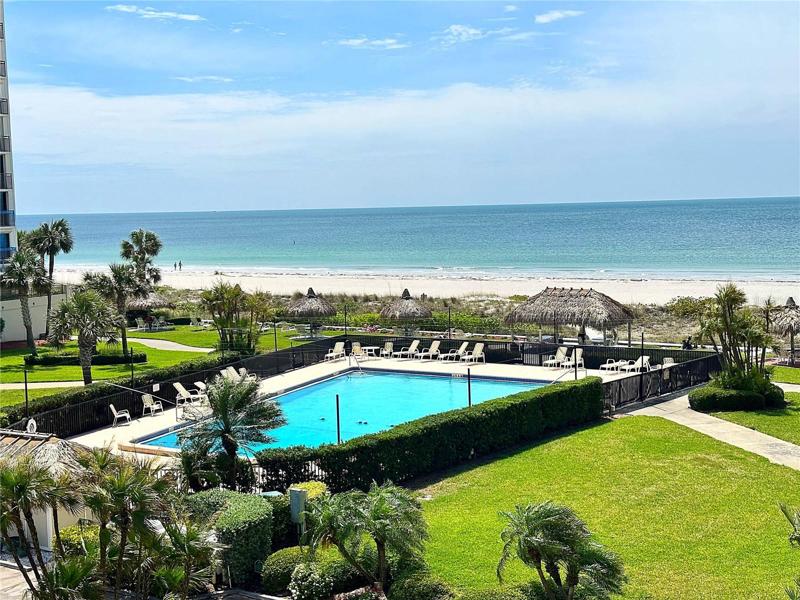 CONDO OVERLOOKS THE BEACH AND LARGE HEATED POOL