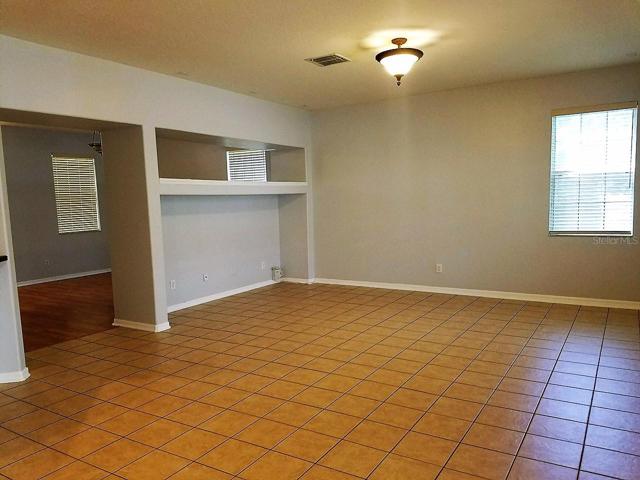 View of screened lanai from Family room