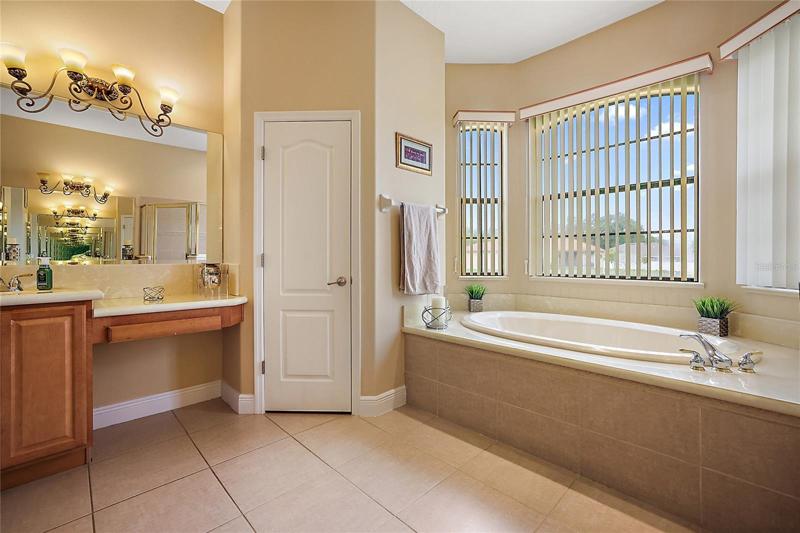 Master Bathroom with Linen Closet and Garden Tub