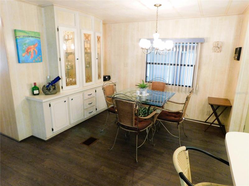 Dining area is open with kitchen.