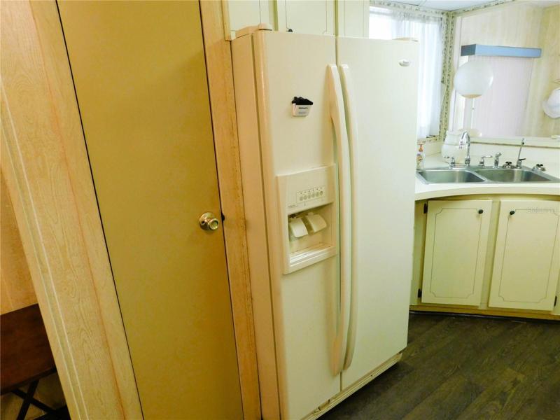 Closet pantry in this kitchen.