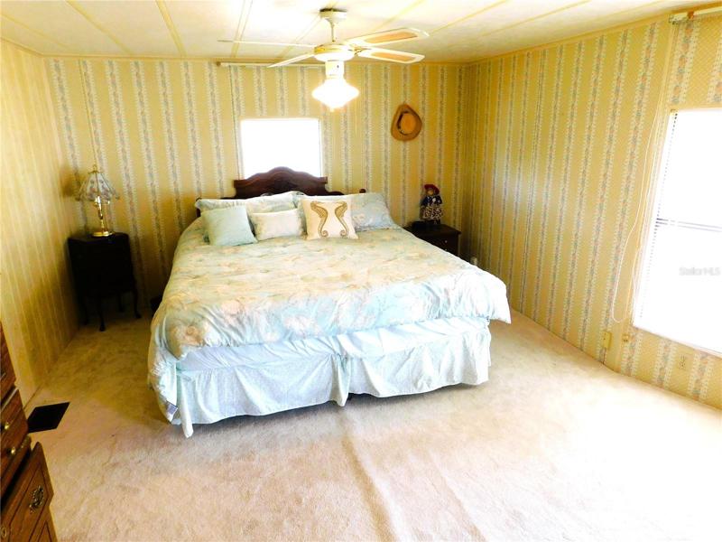 Master bedroom is located in the back of the home.