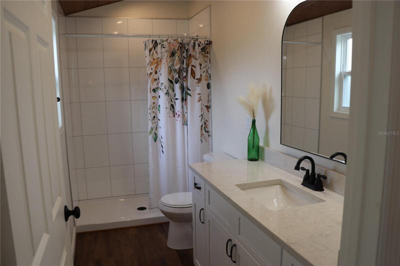 Gorgeous Bathroom featuring a Walk-In Shower