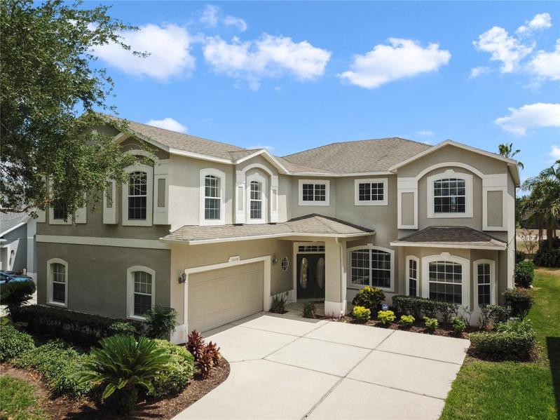 The idyllic Florida lifestyle you've always dreamed of awaits in the GUARD GATED Stoneybrook West community with a SCREENED POOL, golf course views from a huge second floor balcony, main floor bed/bath, flexible living spaces and an oversized Owner’s Suite for the perfect retreat!