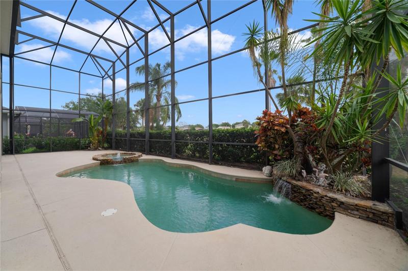 Whether you relax on the balcony or spend the afternoon poolside on the lanai it is all screened for your comfort and the gorgeous pool ties it all together for the perfect outdoor living space!