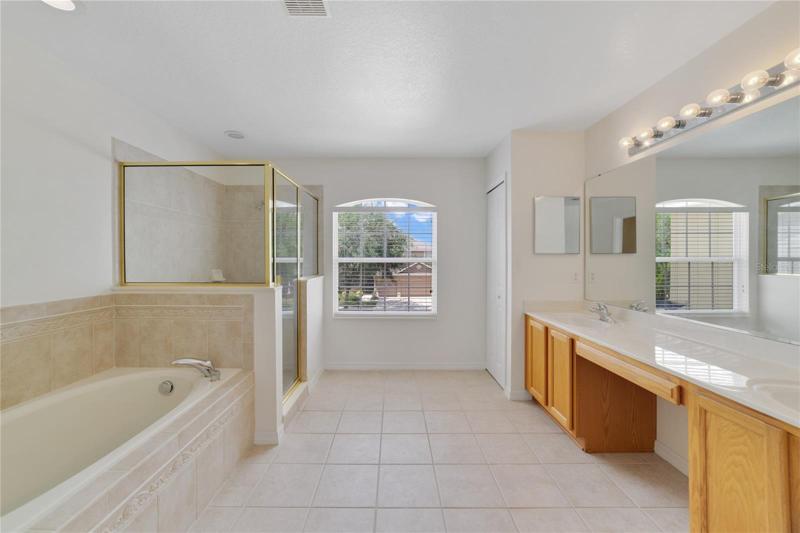 Start and end your day in the spacious bathroom delivering an extended dual sink vanity with space for seating, soaking tub and large separate shower!