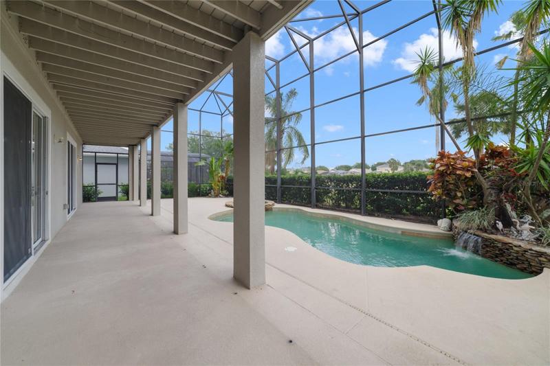 Whether you relax on the balcony or spend the afternoon poolside on the lanai it is all screened for your comfort and the gorgeous pool ties it all together for the perfect outdoor living space!
