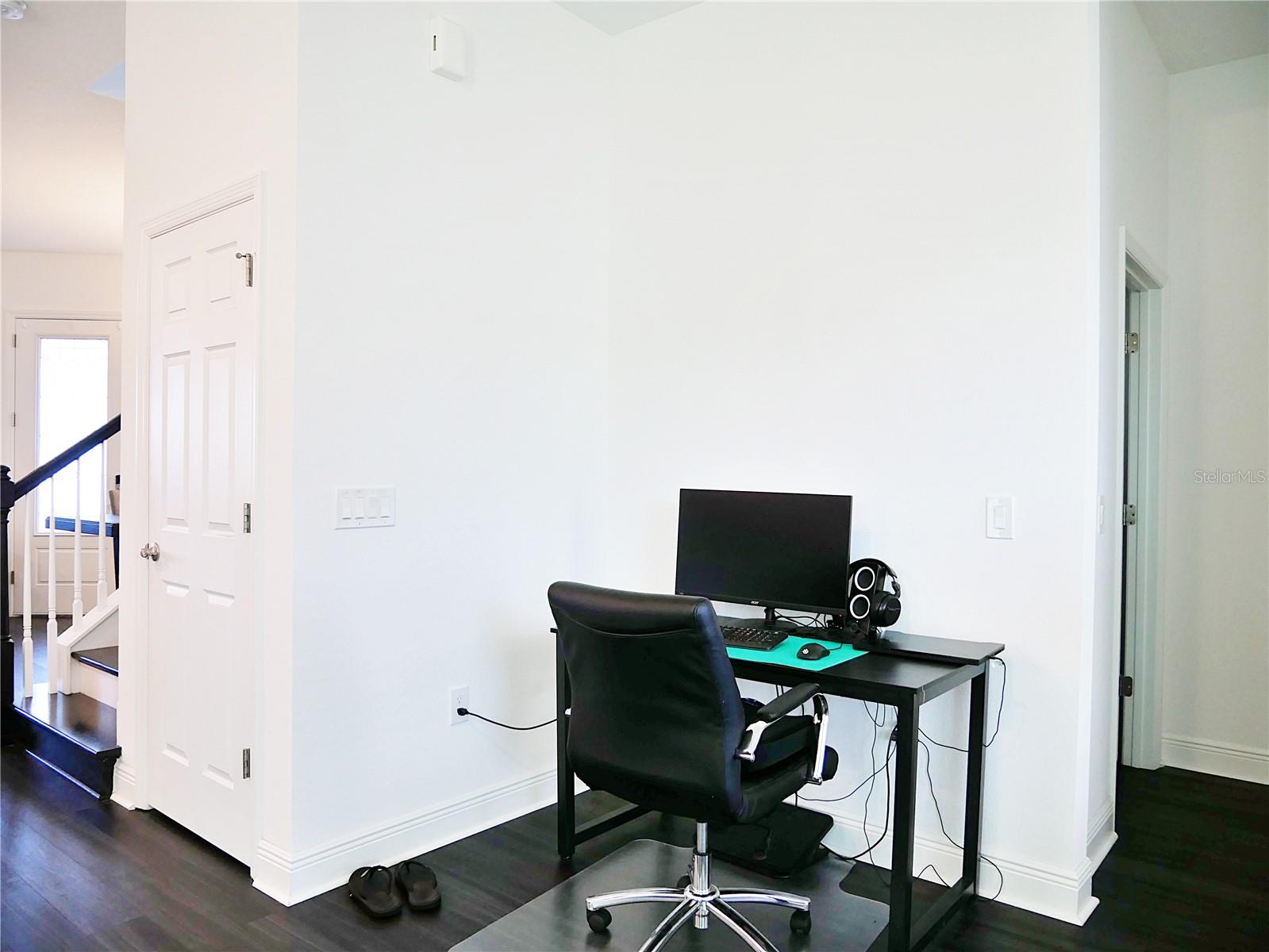 Office corner available in the living room.