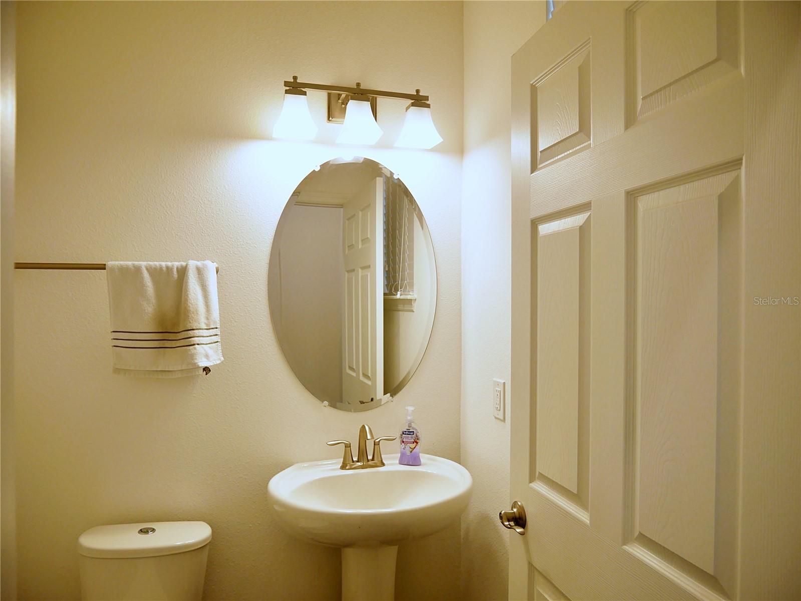 Spacious half bath on the first floor.