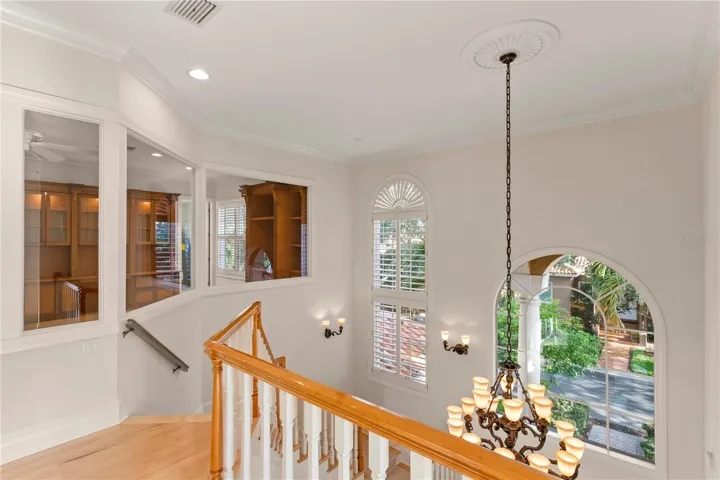 Stairway to 2nd Level with View of Executive Office