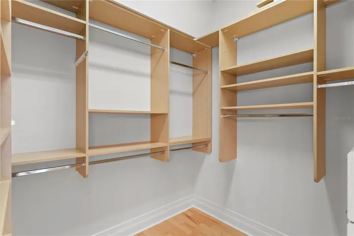 His and Her Owner Closets  1 of 2
