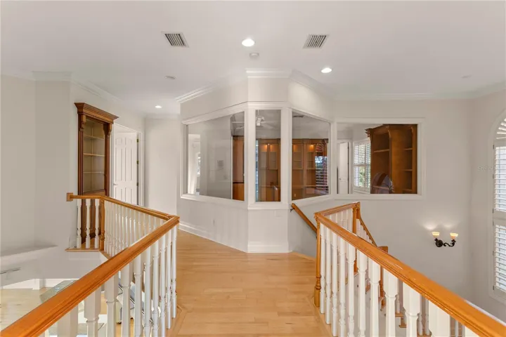 Hallway from Guest Bedrooms leading to East Wing Owners Suite and Office