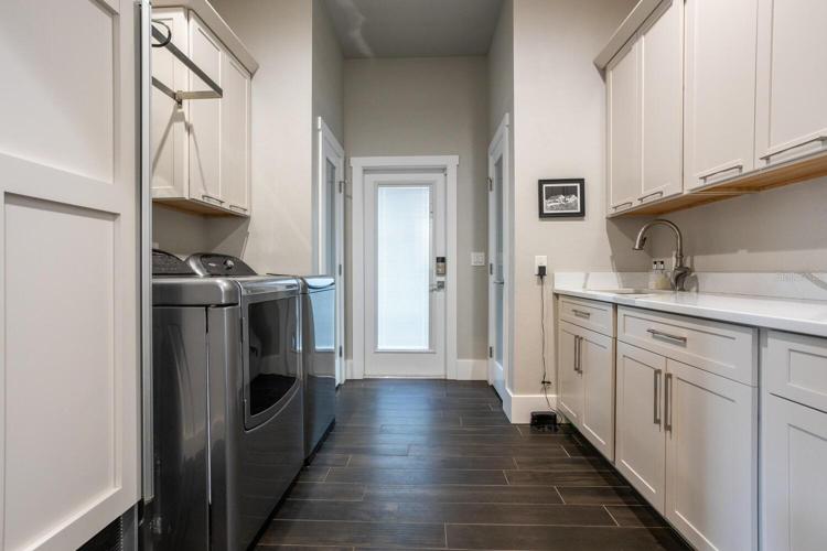 Full laundry. Storage and SubZero Frig built in
