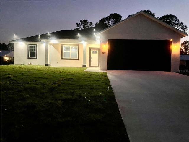 Front with night lightingSTOCK PHOTO, NOT ACTUAL HOUSE