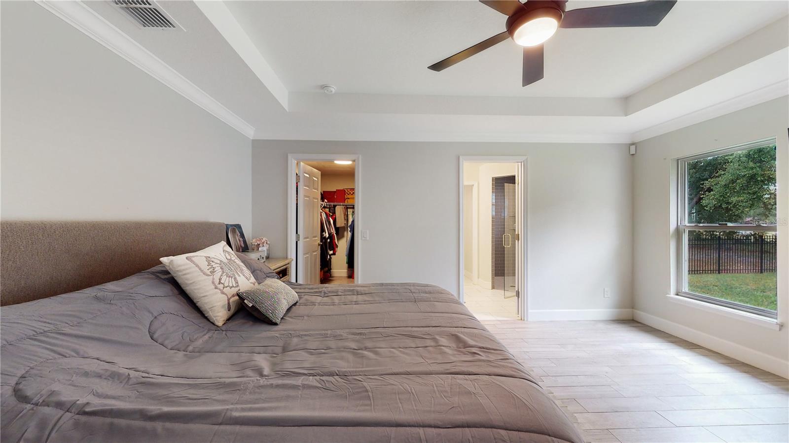 Large walk in closet on the left. En suite bathroom on the right.