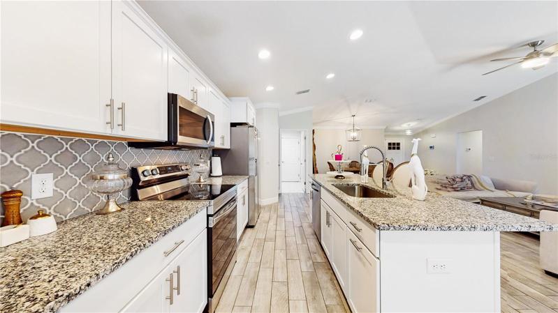 SS appliances just two years old. Granite tops everywhere