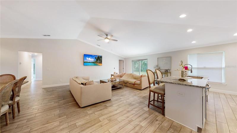 Split plan master bedroom on the far right. The secondary bedrooms on the left