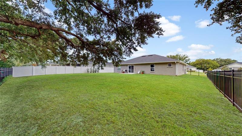 THAT YARD !!! The largest lot in Magnolia Estates that is available for purchase