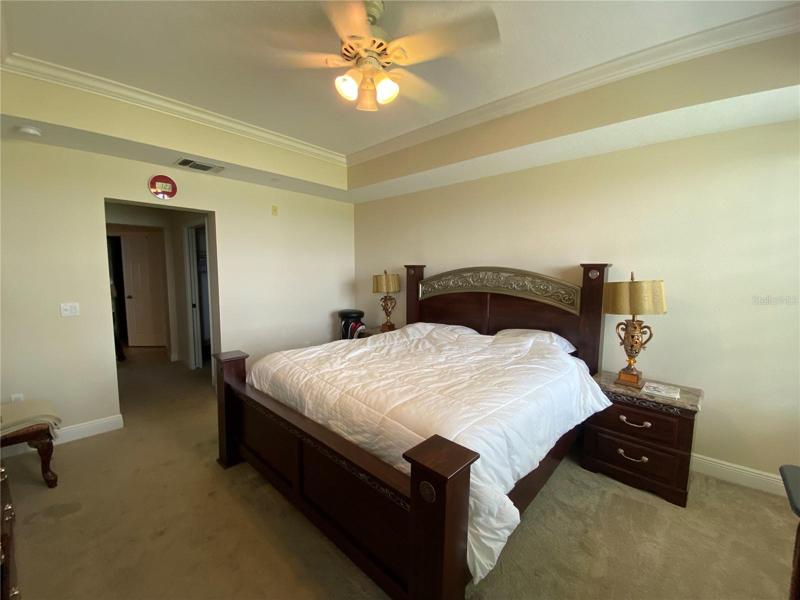 Master bed with water view, facing south