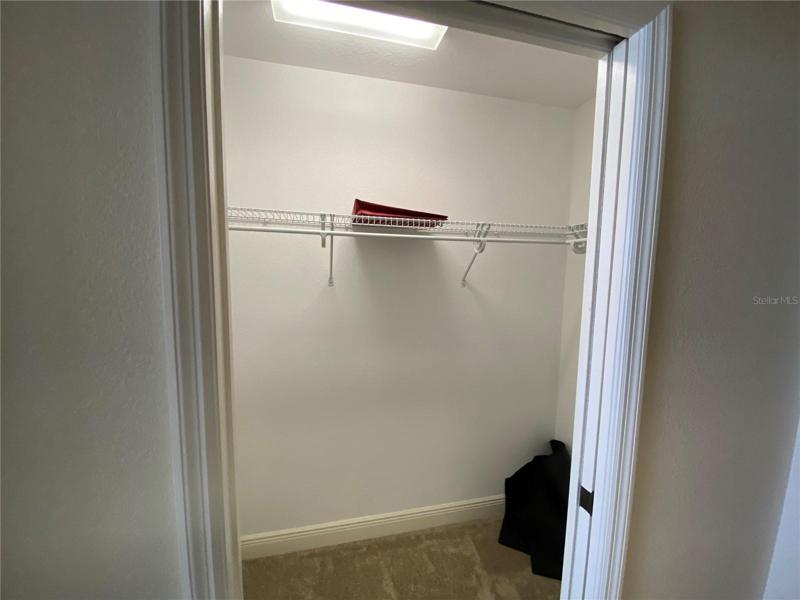 Master bed walk in closet 2