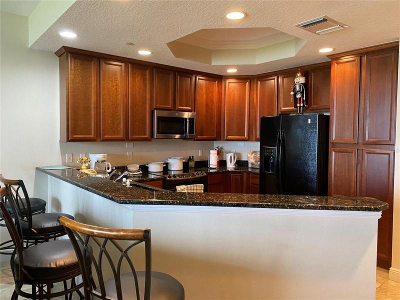 Kitchen, with four bar chairs