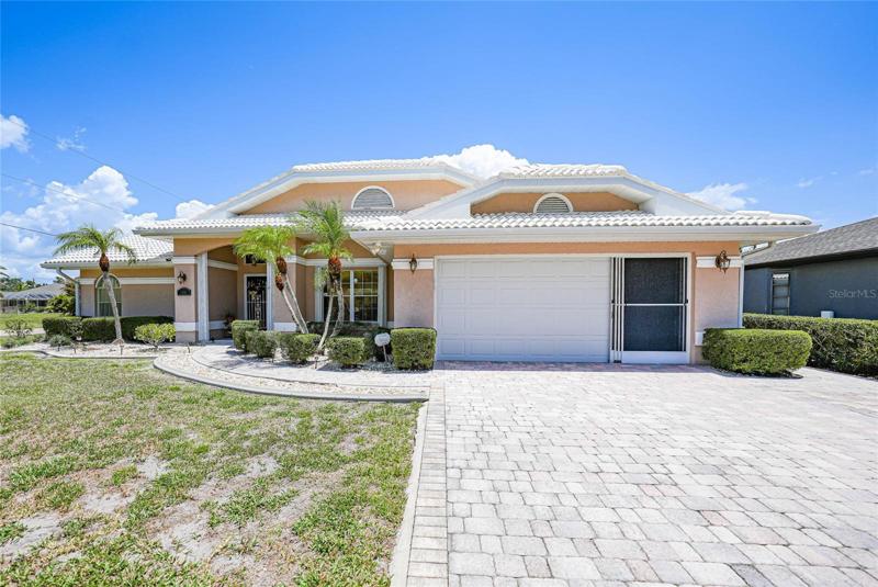 Paved driver is another quality feature of this immaculate home.