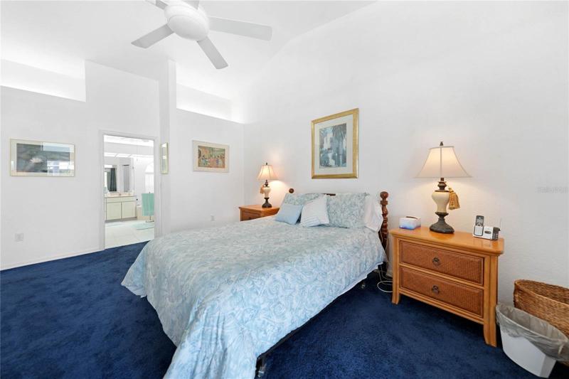 Split floor plan features Master Bedroom on opposite side of two  guest bedrooms.