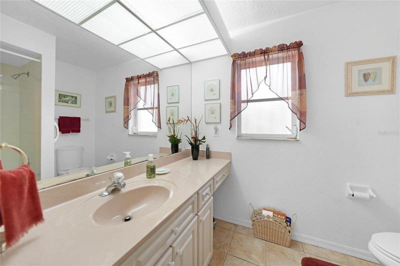 Guess bathroom is spacious with lots of countertop space and a tub/shower combination.