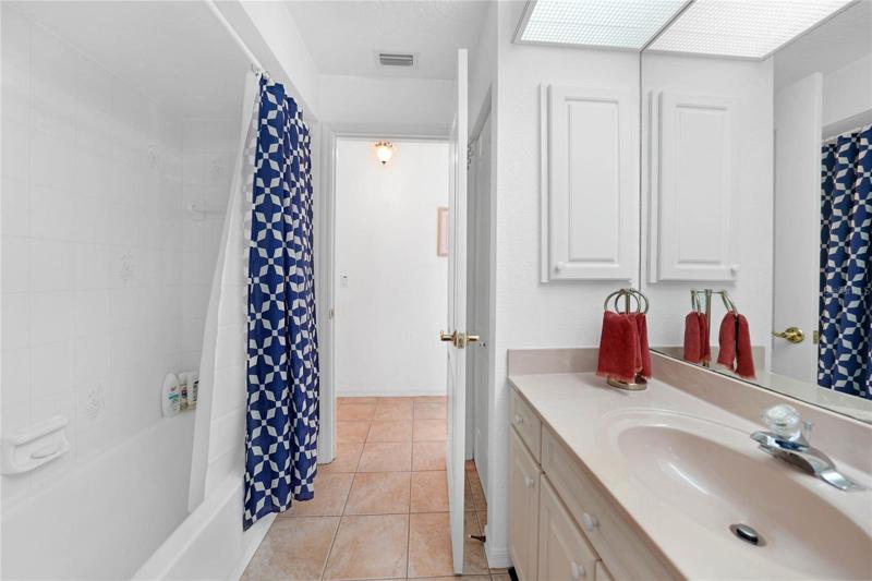 Enjoy a refreshing bath or shower. Bathroom also has a linen closet for extra storage.