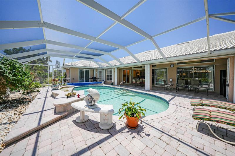 Mature landscaping, both inside the lanai, and out.